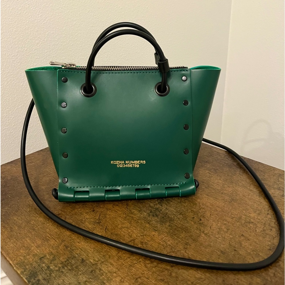 High grade calf leather, glossy zipper, shoulder carry & cross body carry
